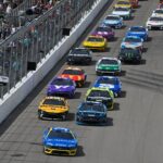 NASCAR Cup Series driver Michael McDowell (34) leads the field to start the NASCAR Enjoy Illinois 300 presented by TicketSmarter at World Wide Technology Raceway.
