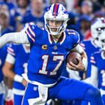 Buffalo Bills quarterback Josh Allen (17) carries the ball in the fourth quarter against the Miami Dolphins at Highmark Stadium.