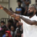 NBA star LeBron James coaches Strive for Greatness during the Strive for Greatness and Mokan Elite basketball game at the fourth day of the Nike Peach Jam at Riverview Park Activities Center.