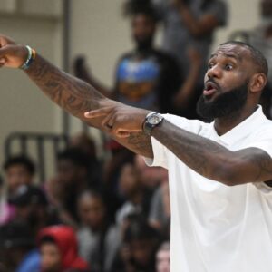 NBA star LeBron James coaches Strive for Greatness during the Strive for Greatness and Mokan Elite basketball game at the fourth day of the Nike Peach Jam at Riverview Park Activities Center.
