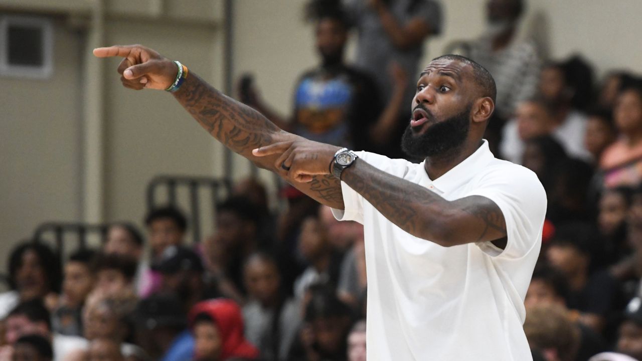 NBA star LeBron James coaches Strive for Greatness during the Strive for Greatness and Mokan Elite basketball game at the fourth day of the Nike Peach Jam at Riverview Park Activities Center.