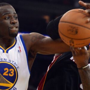 The Golden State Warriors Draymond Green (23) and the Miami Heat LeBron James battle for the ball under the Warriors basket in the second quarter at Oracle Arena in Oakland, California,
