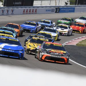 Drivers enter turn four during a re-start during the Enjoy Illinois 300 at World Wide Technology Raceway.
