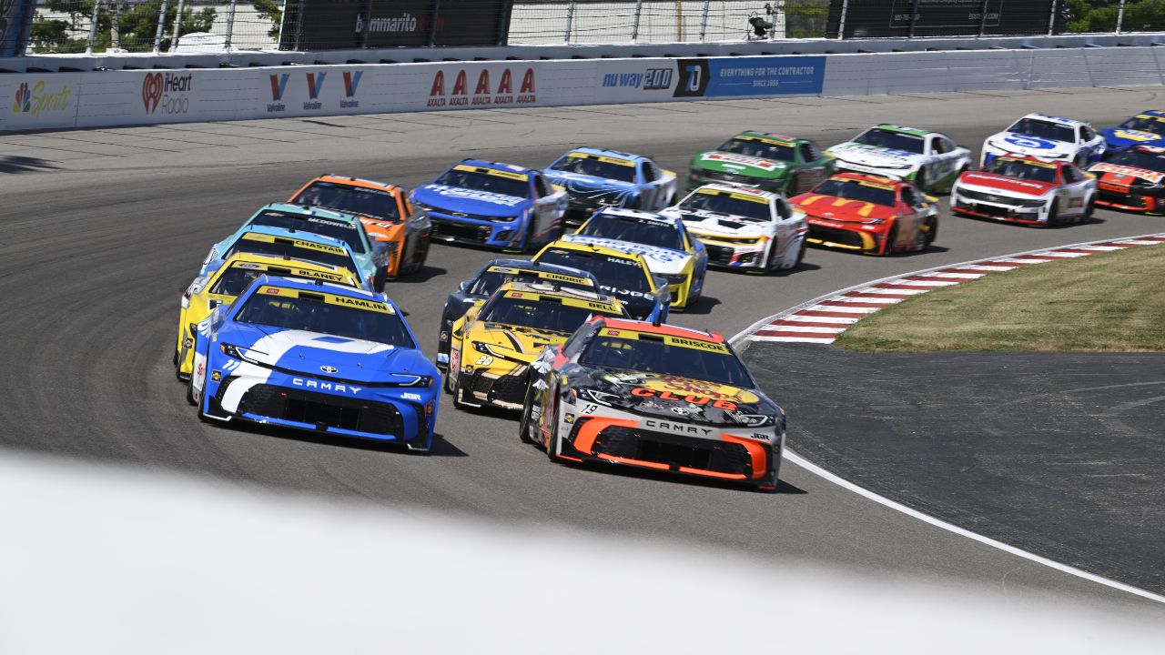 Drivers enter turn four during a re-start during the Enjoy Illinois 300 at World Wide Technology Raceway.