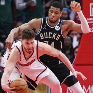 Milwaukee Bucks forward Giannis Antetokounmpo (34) defends against Houston Rockets center Alperen Sengun (28) during the fourth quarter at Toyota Center.