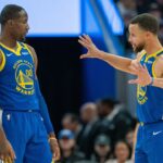 Jonathan Kuminga and Steph Curry