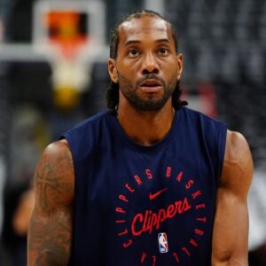 LA Clippers forward Kawhi Leonard (2) warms up before the game against the Denver Nuggets at Ball Arena.