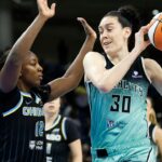 Sep 11, 2025; Chicago, Illinois, USA; New York Liberty forward Breanna Stewart (30) drives to the basket against Chicago Sky forward Michaela Onyenwere (12) during the first half at Wintrust Arena.
