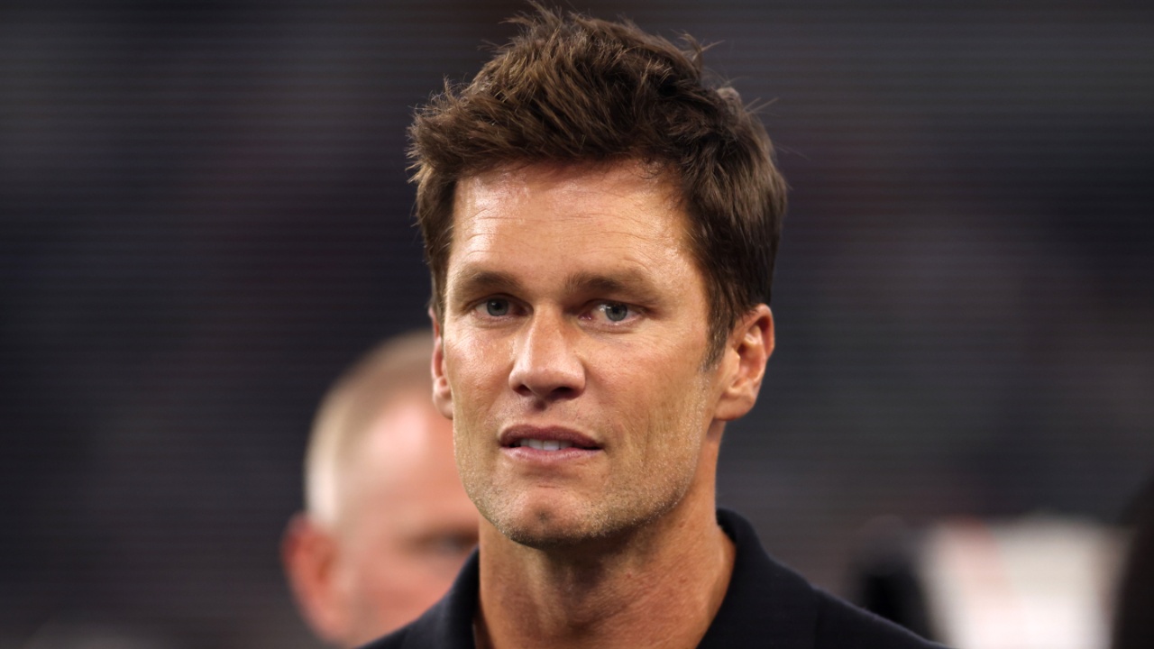 Former NFL player Tom Brady on the field before the game between the Dallas Cowboys and the Las Vegas Raiders at AT&T Stadium.