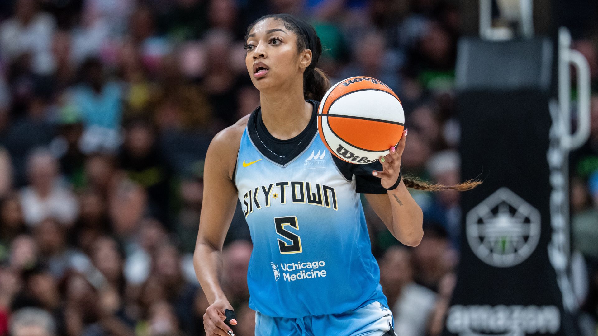 Aug 30, 2025; Seattle, Washington, USA; Chicago Sky forward Angel Reese (5) dribbles the ball against the Seattle Storm at Climate Pledge Arena.