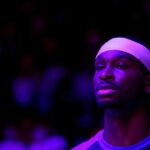 Apr 4, 2025; Houston, Texas, USA; Oklahoma City Thunder guard Shai Gilgeous-Alexander (2) stands during the national anthem prior to the game against the Houston Rockets at Toyota Center.