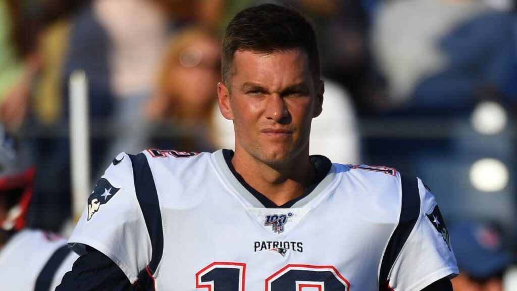 New England Patriots quarterback Tom Brady (12) prior to the coin toss before the preseason game against the Tennessee Titans at Nissan Stadium.
