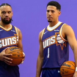 Phoenix Suns forward Dillon Brooks (3) and guard Devin Booker (1) pose for portrait during Media Day at PHX Arena.