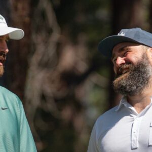Travis Kelce and brother Jason Kelce talk on the 4th tee during the first round of the American Century Celebrity Championship golf tournament at Edgewood Tahoe Golf Course in Stateline, Nev.