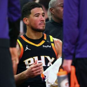 Phoenix Suns guard Devin Booker (1) reacts on the bench against the Oklahoma City Thunder during the second half at Footprint Center.