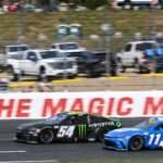 Sep 21, 2025; Loudon, New Hampshire, USA; NASCAR Cup Series driver Denny Hamlin (11) and NASCAR Cup Series driver Ty Gibbs (54) race during the Mobil 1 301 at New Hampshire Motor Speedway