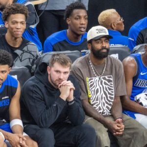 Dallas Mavericks Luka Doncic 77 and Kyrie Irving 11 watch from the bench during an NBA, Basketball