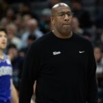 Sacramento Kings coach Mike Brown calls a timeout during NBA