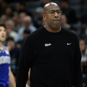 Sacramento Kings coach Mike Brown calls a timeout during NBA