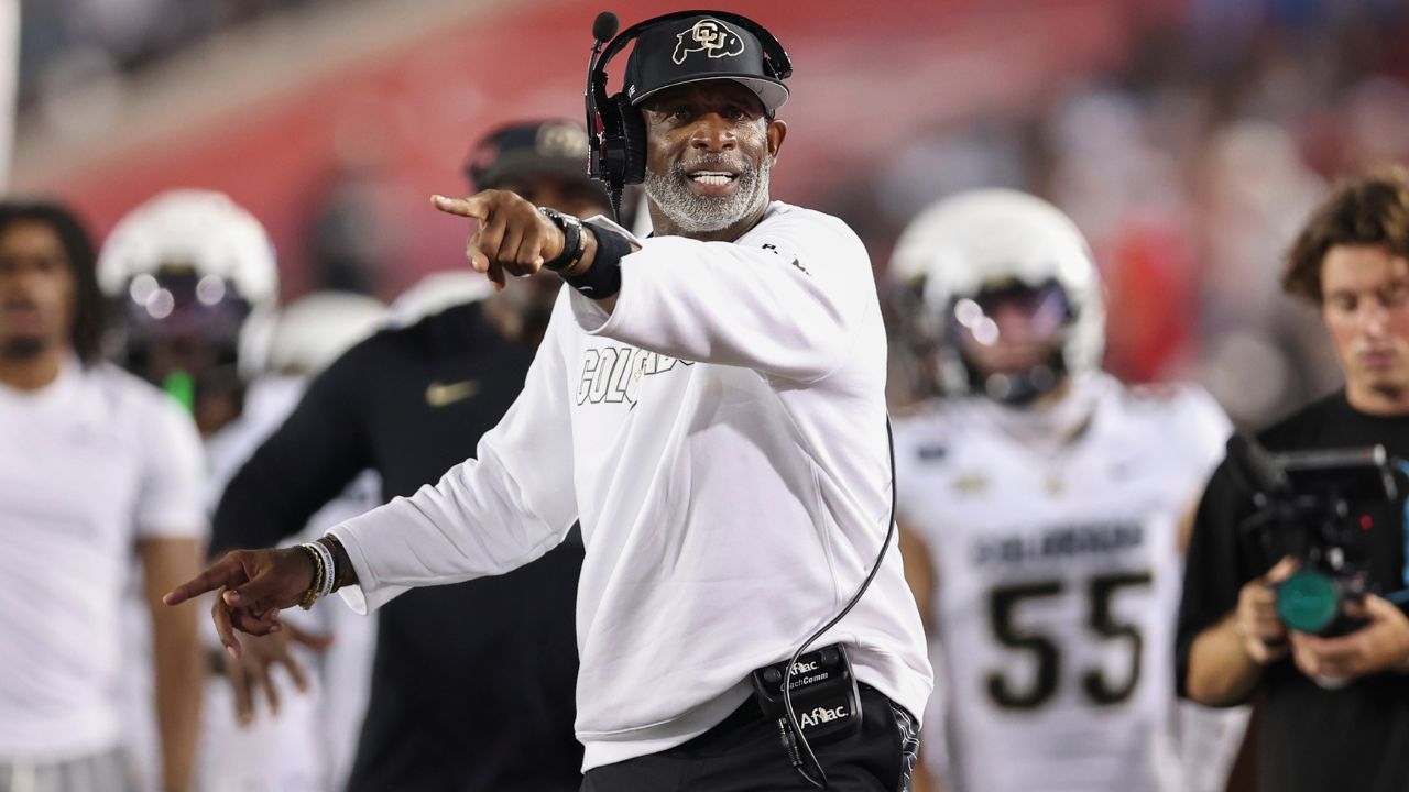 Colorado Buffaloes head coach Deion Sanders reacts after a play during the third quarter against the Houston Cougars at TDECU Stadium.