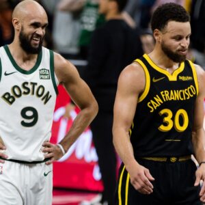 Dec 19, 2023; San Francisco, California, USA; Boston Celtics guard Derrick White (9) and Golden State Warriors guard Stephen Curry (30) on the court during the overtime period at Chase Center.
