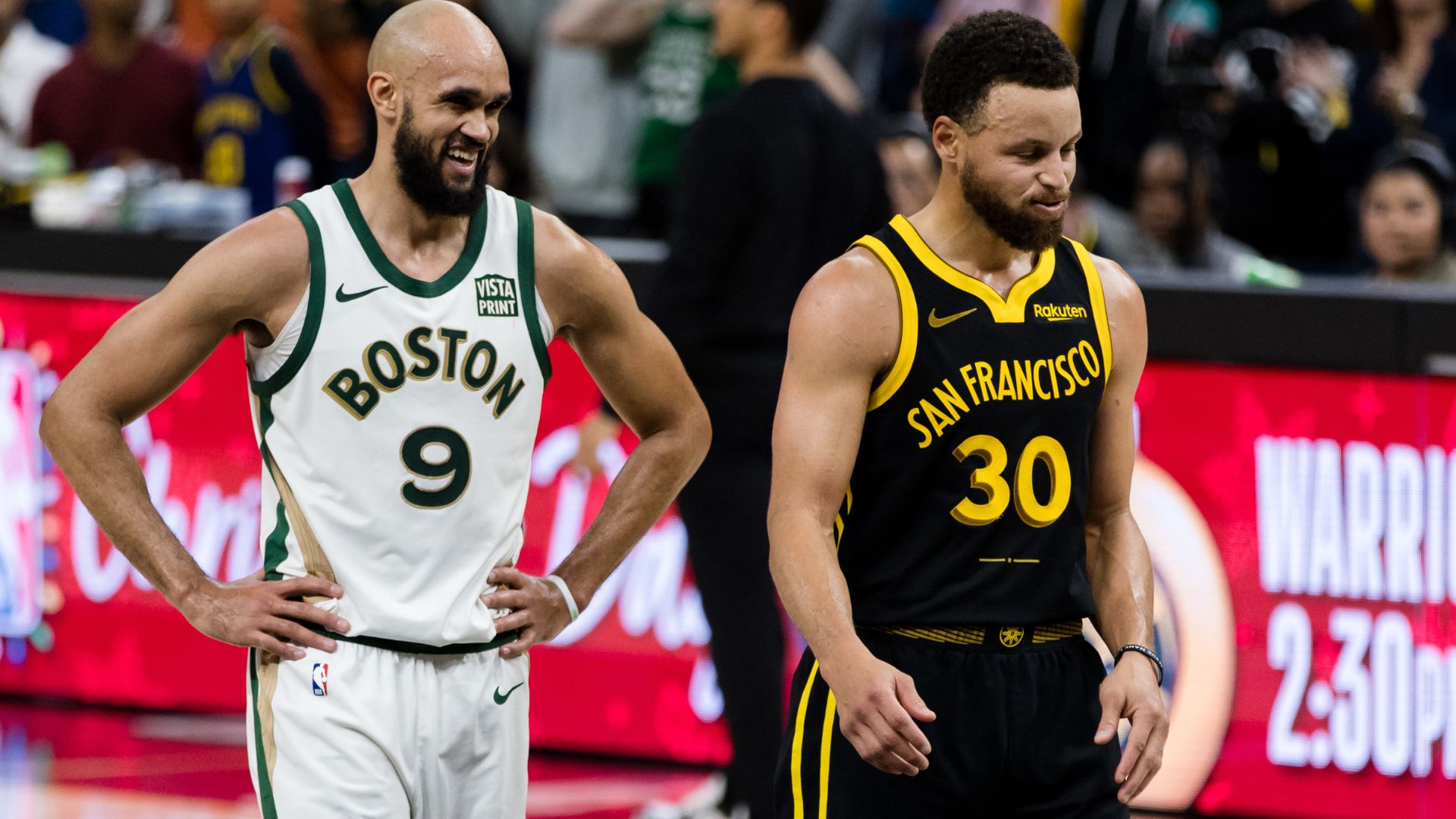 Dec 19, 2023; San Francisco, California, USA; Boston Celtics guard Derrick White (9) and Golden State Warriors guard Stephen Curry (30) on the court during the overtime period at Chase Center.