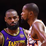Oct 28, 2024; Phoenix, Arizona, USA; Los Angeles Lakers forward LeBron James (23) against Phoenix Suns forward Kevin Durant (35) at Footprint Center