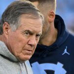 North Carolina Tar Heels head coach Bill Belichick on the field before the game at Kenan Stadium.