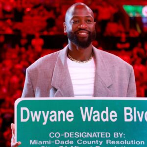 Former Miami Heat guard Dwyane Wade is honored with 'Dwayne Wade Blvd' at halftime during a game against the Detroit Pistons at Kaseya Center.