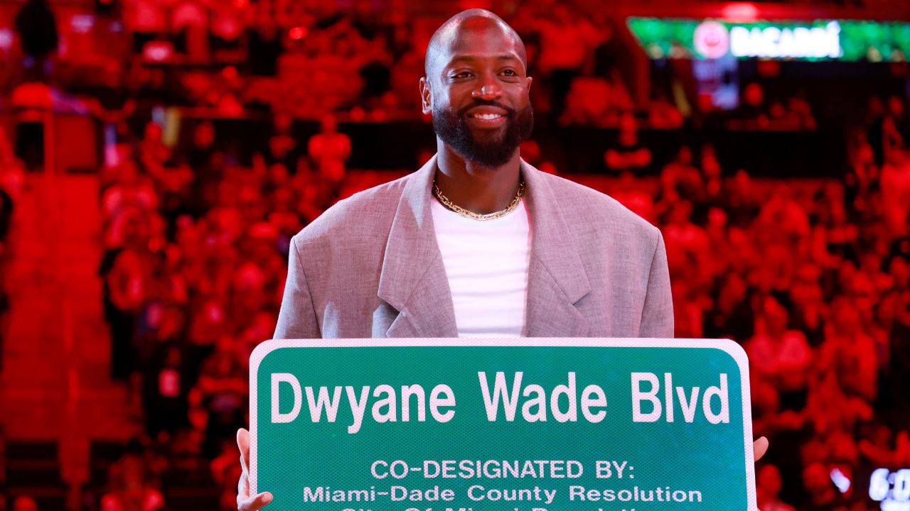 Former Miami Heat guard Dwyane Wade is honored with 'Dwayne Wade Blvd' at halftime during a game against the Detroit Pistons at Kaseya Center.