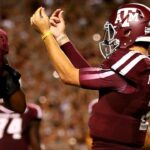 Texas A&M Aggies quarterback Johnny Manziel (2) gestures with his fingers as he celebrates a third quarter touchdown against the SMU Mustangs at Kyle Field.