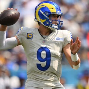 Sep 14, 2025; Nashville, Tennessee, USA; Los Angeles Rams quarterback Matthew Stafford (9) drops back to pass Tennessee Titans during the first half at Nissan Stadium.