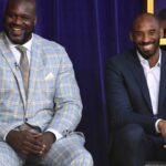 Mar 24, 2017; Los Angeles, CA, USA; Los Angeles Lakers former center Shaquille O'Neal (left) and guard Kobe Bryant react during ceremony to unveil statue of O'Neal at Staples Center.