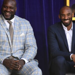 Mar 24, 2017; Los Angeles, CA, USA; Los Angeles Lakers former center Shaquille O'Neal (left) and guard Kobe Bryant react during ceremony to unveil statue of O'Neal at Staples Center.