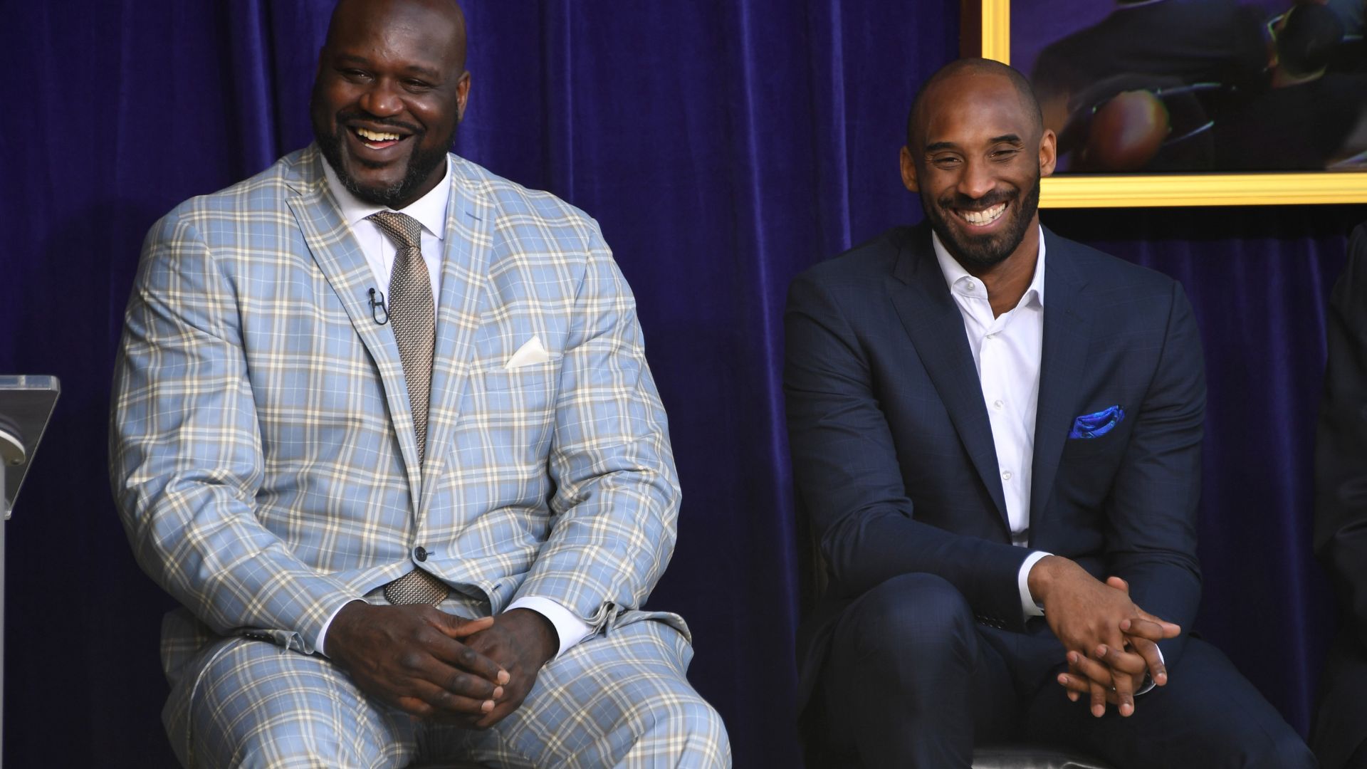 Mar 24, 2017; Los Angeles, CA, USA; Los Angeles Lakers former center Shaquille O'Neal (left) and guard Kobe Bryant react during ceremony to unveil statue of O'Neal at Staples Center.