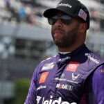 NASCAR Cup Series driver Bubba Wallace walks on pit road prior to practice and qualifying for the The Great American Getaway 400 at Pocono Raceway.