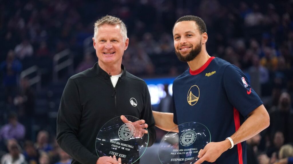 Golden State Warriors head coach Steve Kerr and guard Stephen Curry (30) are recognized as the USA Basketball head coach and male athlete of the year before the start of the game against the Oklahoma City Thunder at the Chase Center.