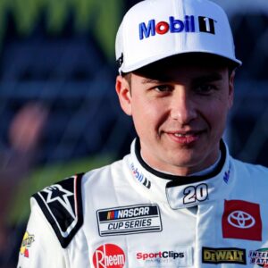 Feb 1, 2025; WInston-Salem, North Carolina, USA; NASCAR Cup Series driver Christopher Bell (20) films a preview video before practice for the Clash at Bowman Gray at Bowman Gray Stadium.