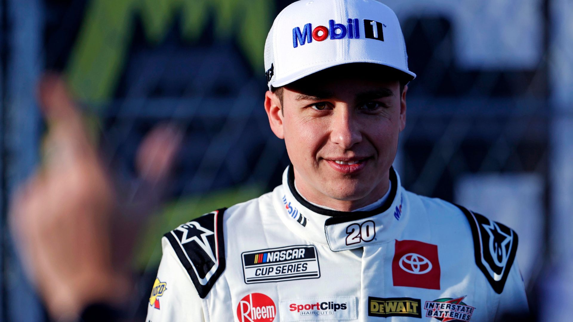 Feb 1, 2025; WInston-Salem, North Carolina, USA; NASCAR Cup Series driver Christopher Bell (20) films a preview video before practice for the Clash at Bowman Gray at Bowman Gray Stadium.