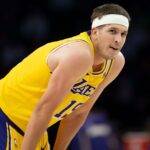 Oct 29, 2025; Minneapolis, Minnesota, USA; Los Angeles Lakers guard Austin Reaves (15) looks on against the Minnesota Timberwolves in the first half at Target Center