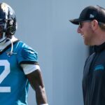 Jacksonville Jaguars wide receiver Travis Hunter (12) has a laugh with Jacksonville Jaguars head coach Liam Coen during the Jacksonville Jaguars’ third mandatory minicamp Thursday June 12, 2025 at the Miller Electric Center in Jacksonville, Fla. [Doug Engle/Florida Times-Union]