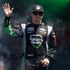 Jul 13, 2025; Sonoma, California, USA; NASCAR Cup Series driver Justin Haley (7) waves after being introduced to fans before the start of the NASCAR Toyota / Save Mart 360 at Sonoma Raceway
