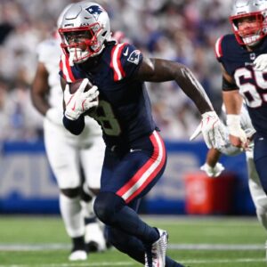 New England Patriots wide receiver Stefon Diggs (8) makes a catch against the Buffalo Bills during the second half at Highmark Stadium.