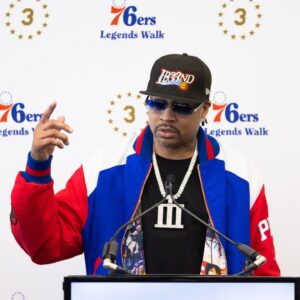 Philadelphia 76ers great Allen Iverson speaks at the podium during the unveiling of a statue honoring him in a ceremony at Penn Medicine Philadelphia 76ers Training Complex.