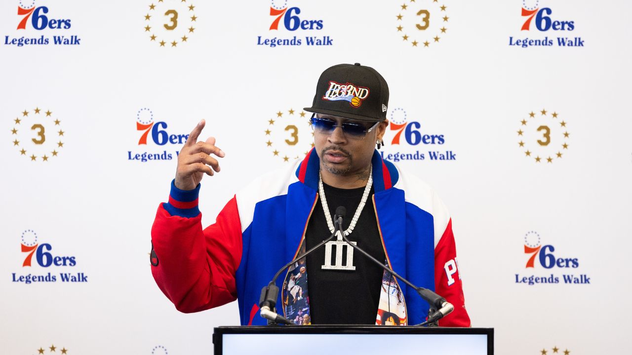Philadelphia 76ers great Allen Iverson speaks at the podium during the unveiling of a statue honoring him in a ceremony at Penn Medicine Philadelphia 76ers Training Complex.
