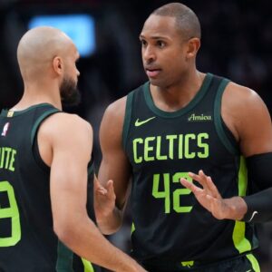 Boston Celtics center Al Horford (42) talks to guard Derrick White (9) during the first half against the Toronto Raptors at Scotiabank Arena