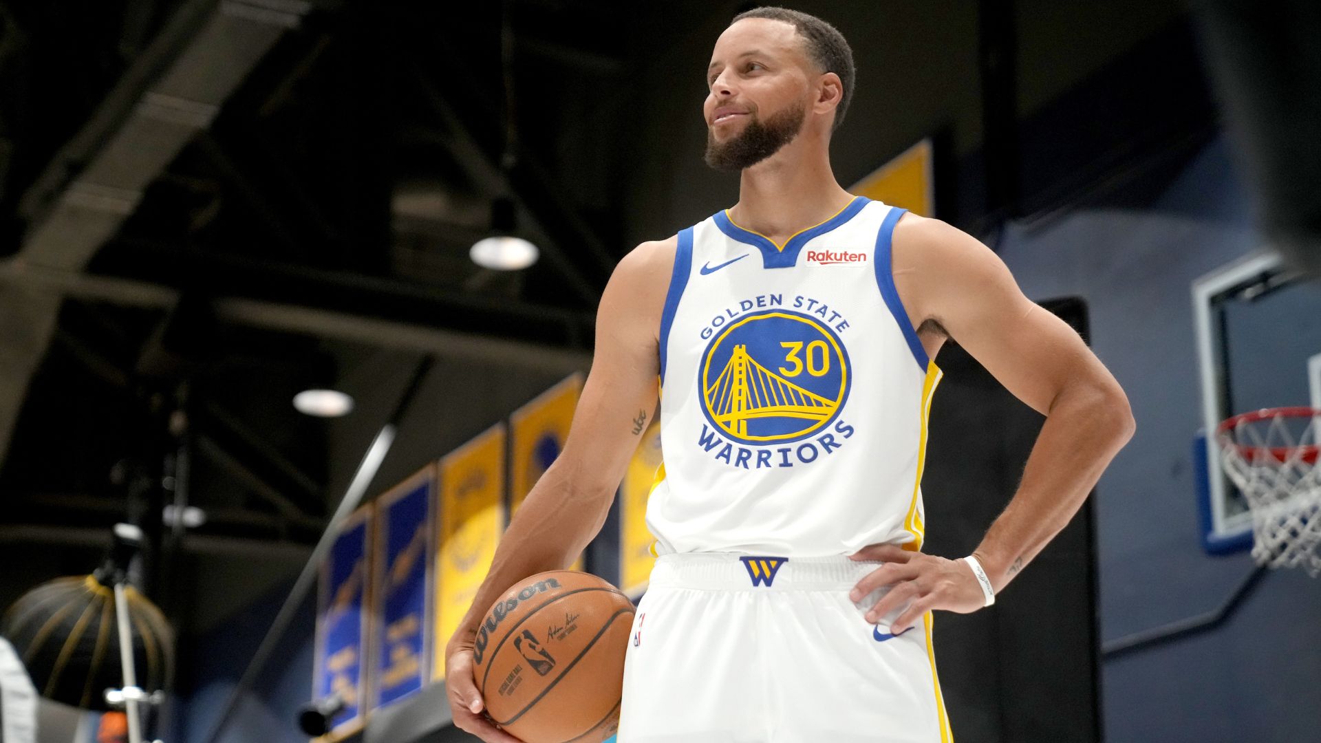 Sep 29, 2025; San Francisco, CA, USA; Golden State Warriors guard Stephen Curry (30) holds onto the ball during Media Day at the Chase Center