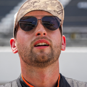 NASCAR Cup Series driver Chase Briscoe (19) watches qualifying Saturday, July 26, 2025, during qualifying for the Brickyard 400 at Indianapolis Motor Speedway.