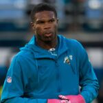 Jacksonville Jaguars wide receiver Travis Hunter (12) spits before an NFL football matchup at EverBank Stadium, Monday, Oct. 6, 2025, in Jacksonville, Fla.