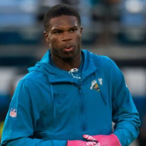 Jacksonville Jaguars wide receiver Travis Hunter (12) spits before an NFL football matchup at EverBank Stadium, Monday, Oct. 6, 2025, in Jacksonville, Fla.